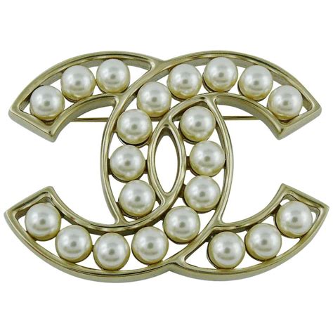 chanel camellia brooch glitter|chanel pearl brooch price.